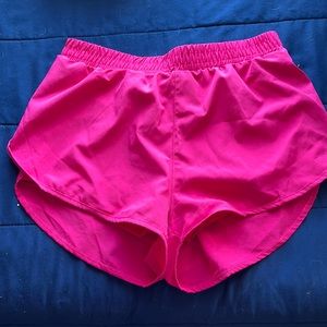 Neon pink sport shorts with spandex